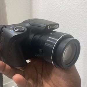 Canon Black Digital Camera with Telephoto Zoom Lens